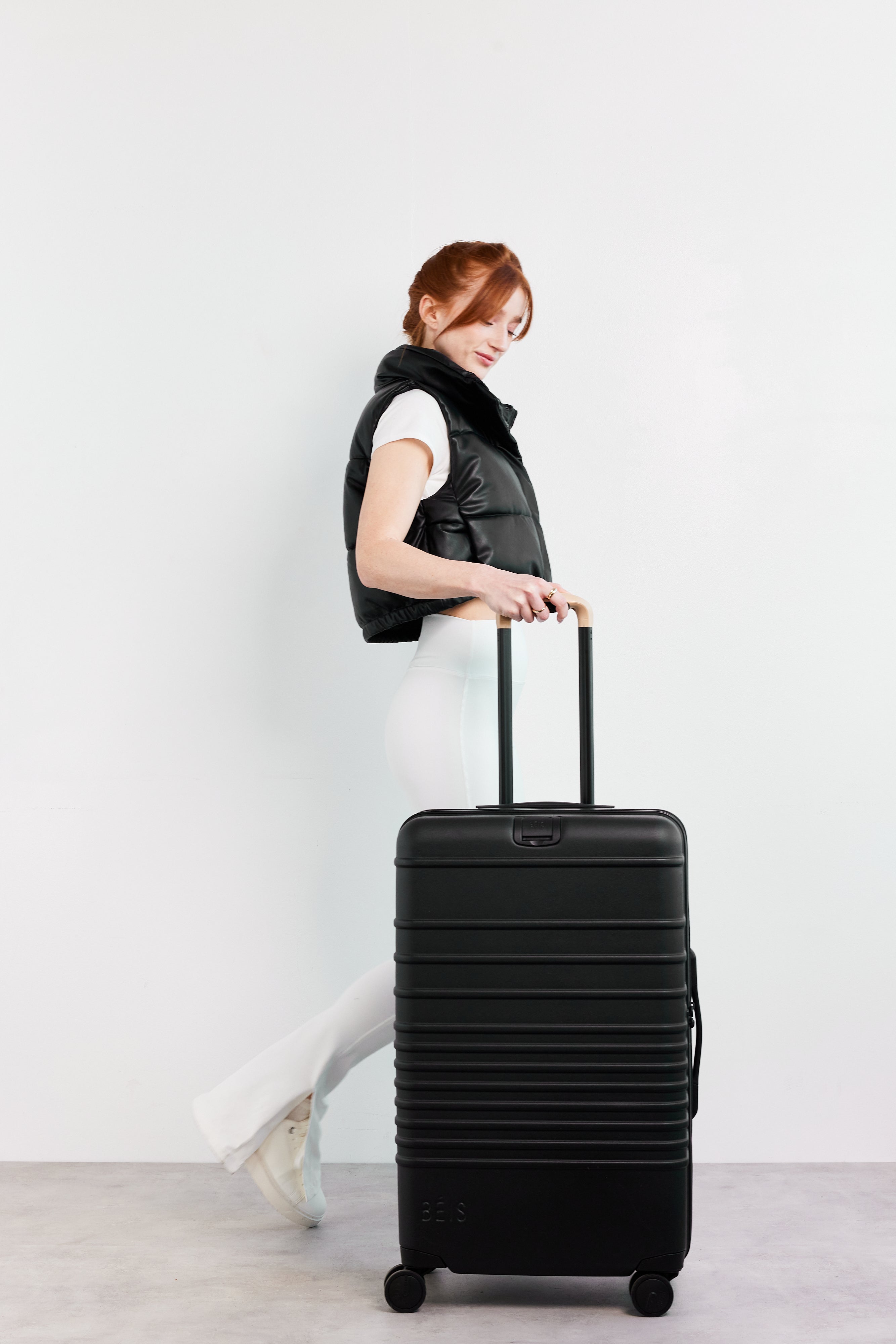 Resale The Medium Check-In Roller in Black